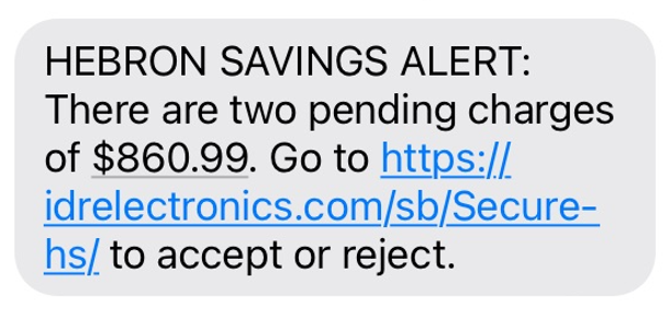 Example text scam. It reads: HEBRON SAVINGS ALERT. There are two pending charges of $860.99. Go to (link) to accept or reject